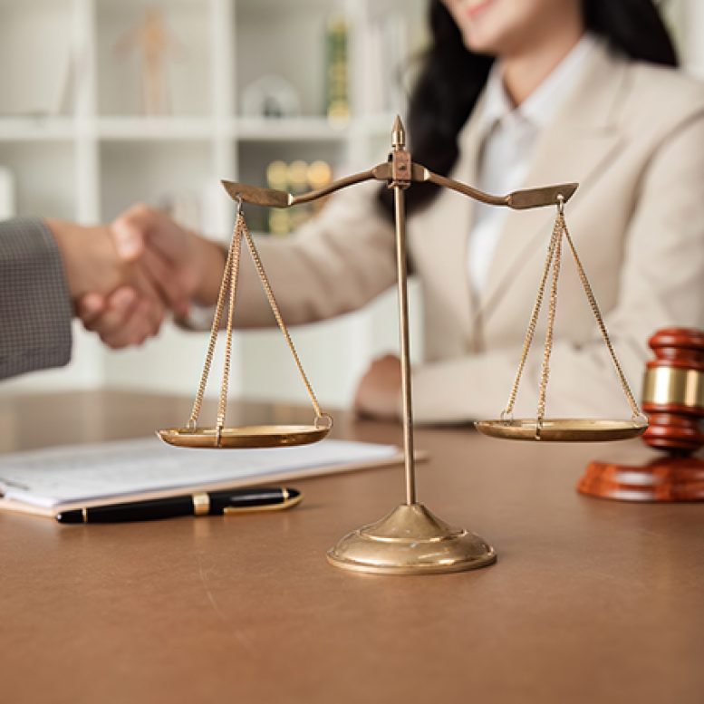 Young married couple carrying cardboard box in front of their new home on moving day Young married couple carrying cardboard box in front of their new house on moving day